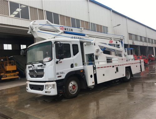 Bright white 24m scissor lift trucks with elevated work platform